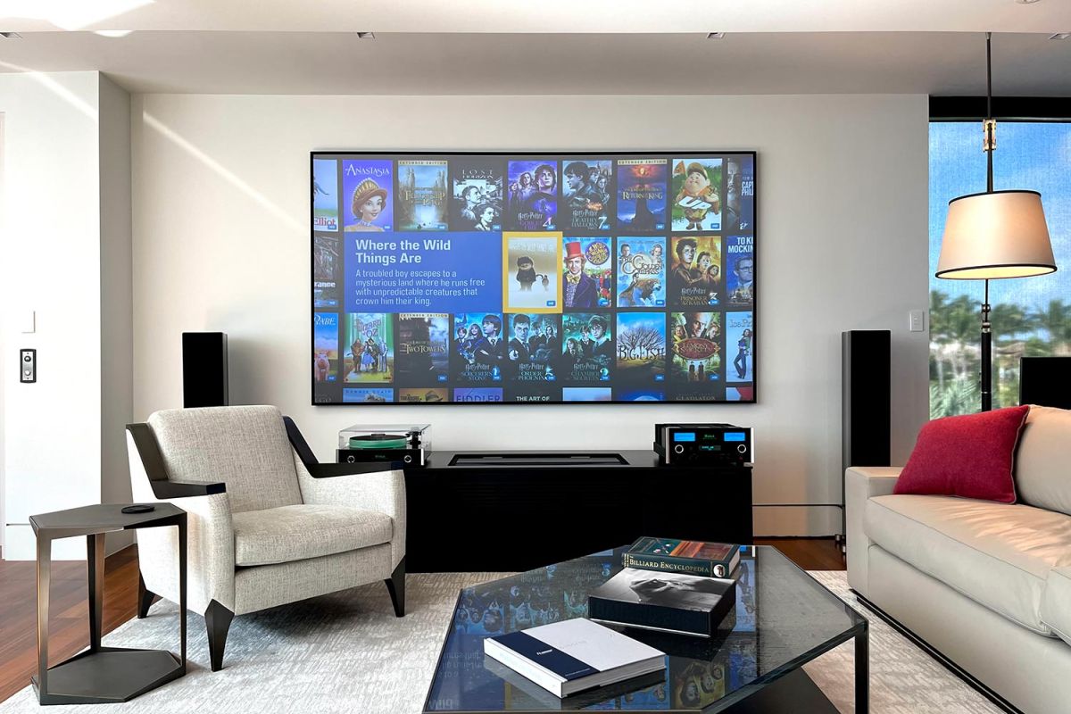 Modern living room with large TV display and elegant contemporary furniture