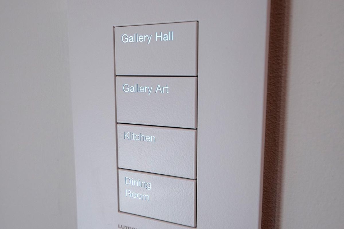 Light switch panel labeled for different areas of the home