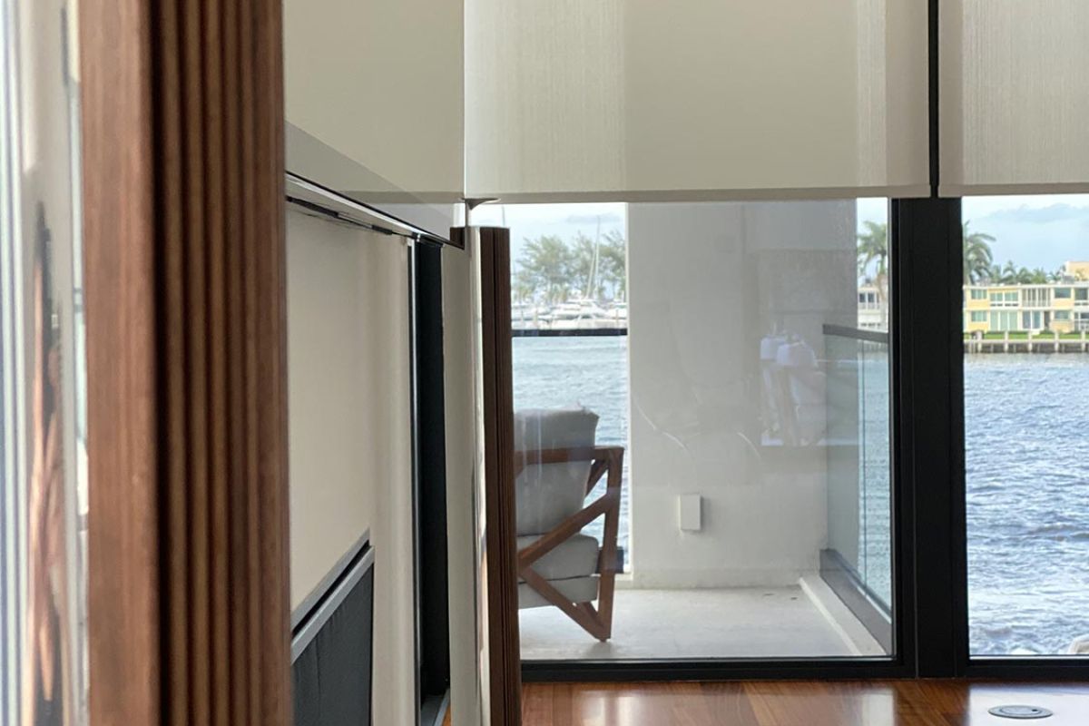 Speaker and window with waterfront view in sleek modern interior