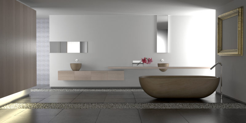 Minimalist white bathroom with stone bathtub and pebbles