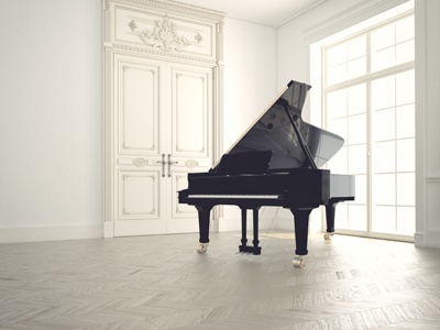 white empty room with only piano