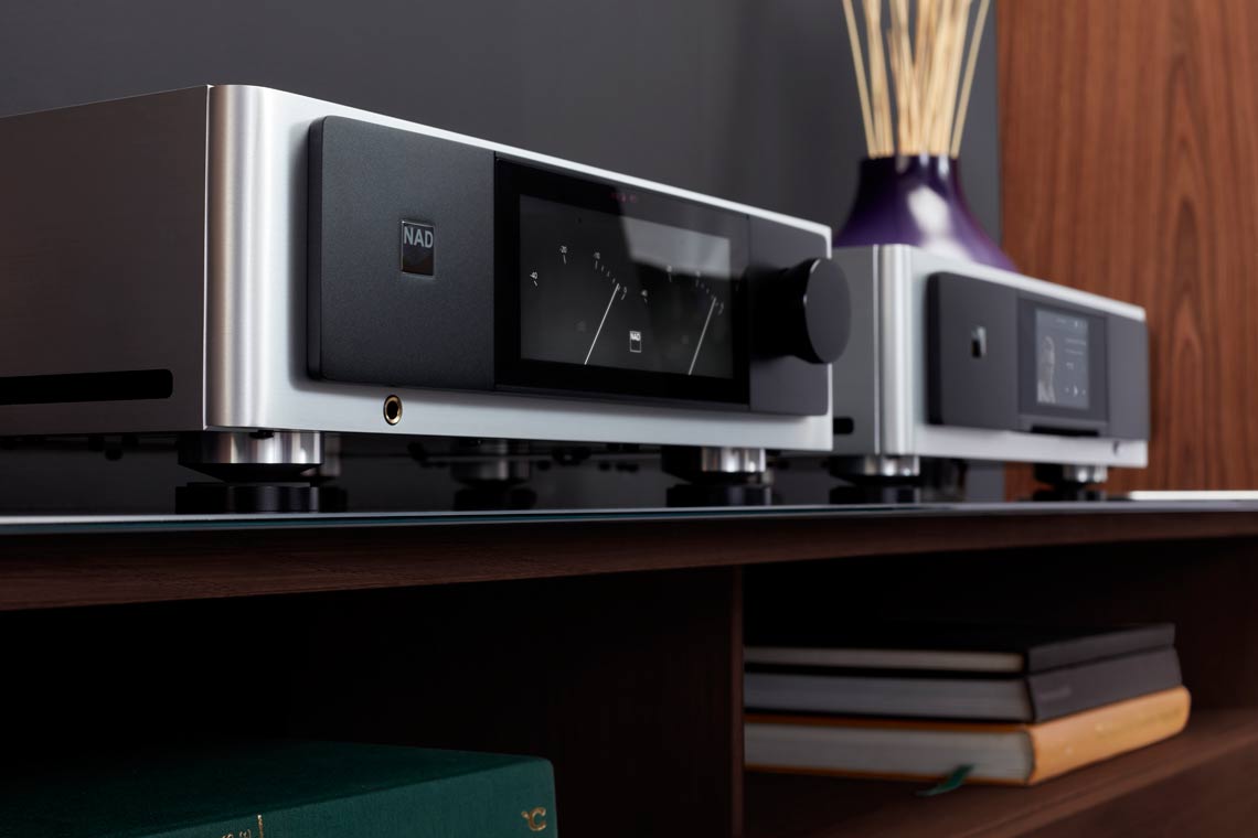 stereo on top of a fancy table with books